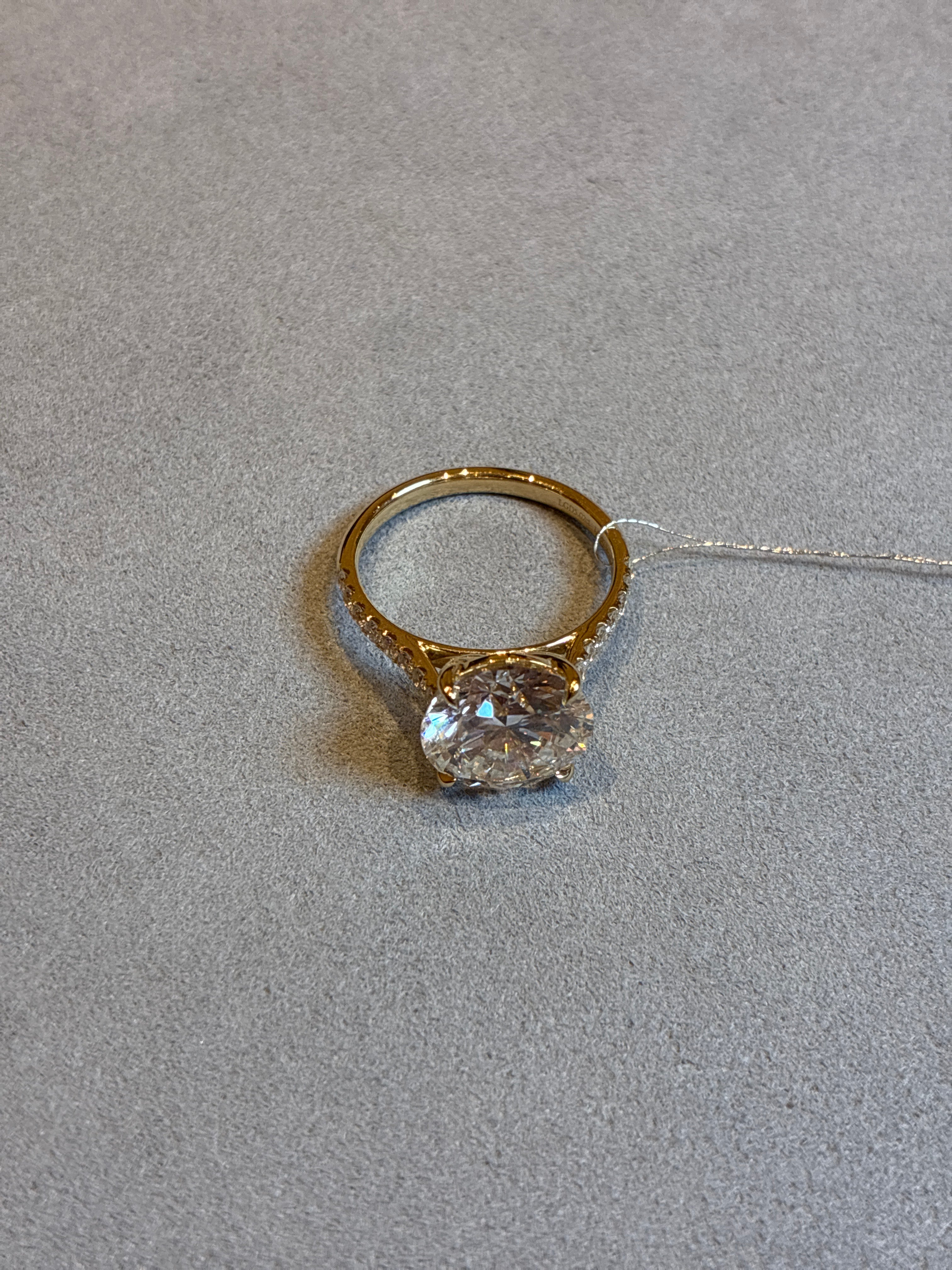 For Ziamy,14k yellow gold,main stone round cut 4ct D VVS1,side stone 0.341ct
